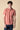 Red marbled garment-dyed polo shirt with contrasting embroidery
