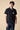 Blue Polo with embroidered V2 fabric pocket