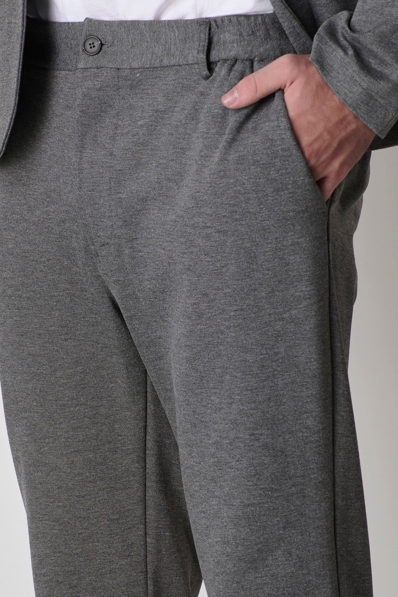 Gray tailored trousers with button