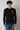 Black pearly crewneck sweater with embroidered patch in V2 fabric