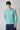 Mint Green crew neck sweater with paint splatter tears and V2 fabric pocket