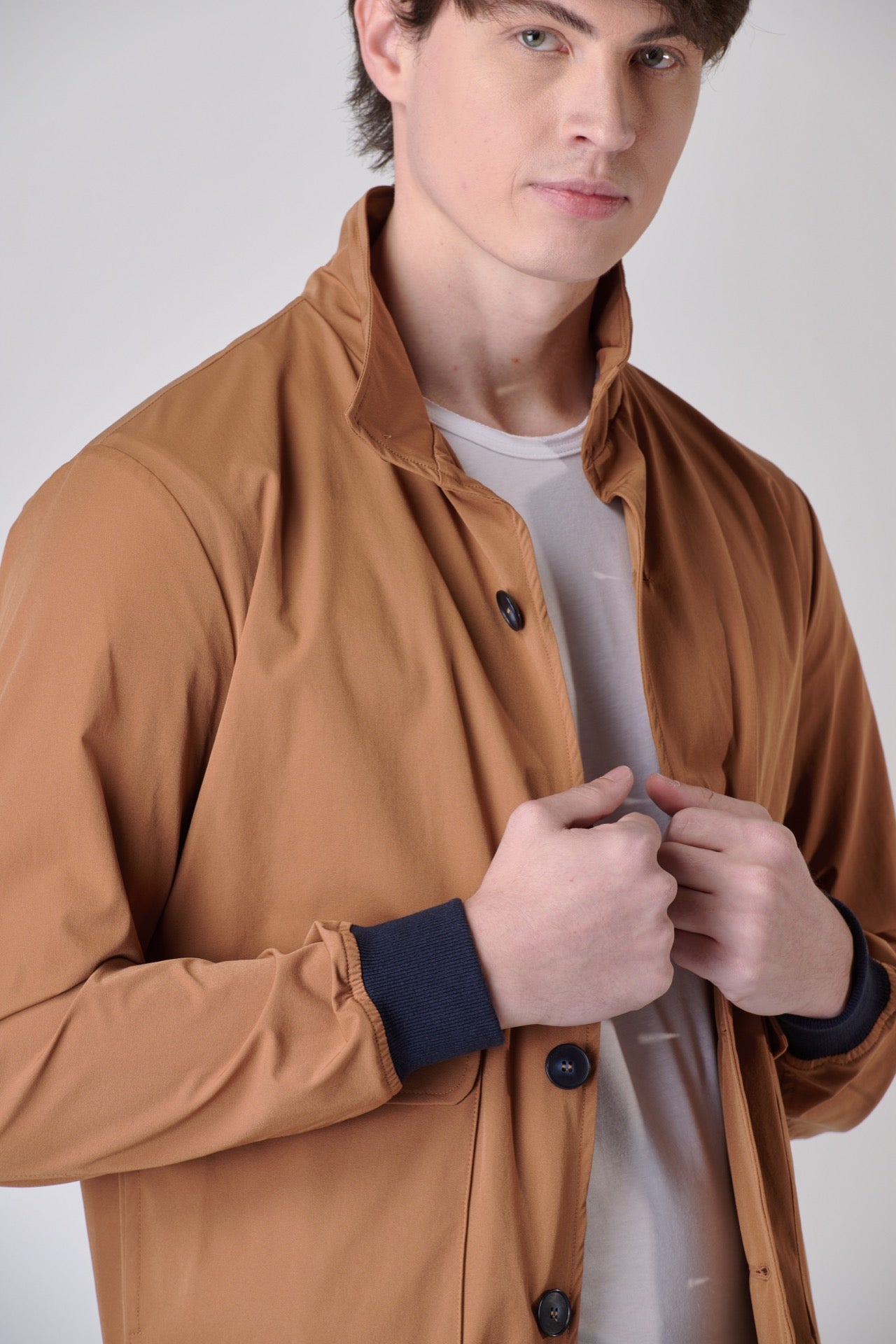 Bomber jacket in technical leather fabric
