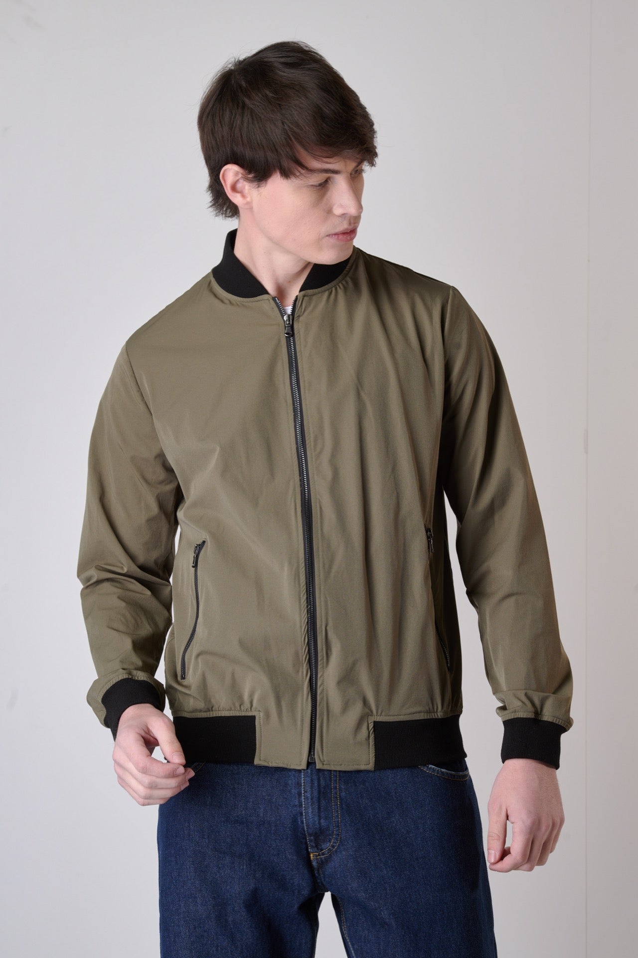 Technical fabric bomber jacket with military green zip