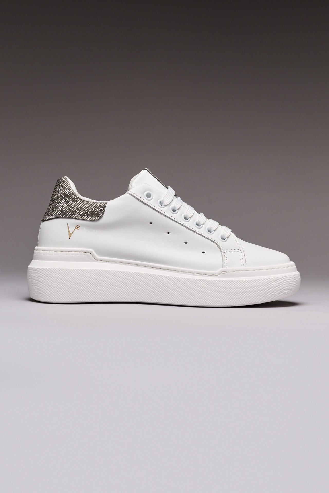 VEGA - White High-Top Sneakers with Silver Pixel Back