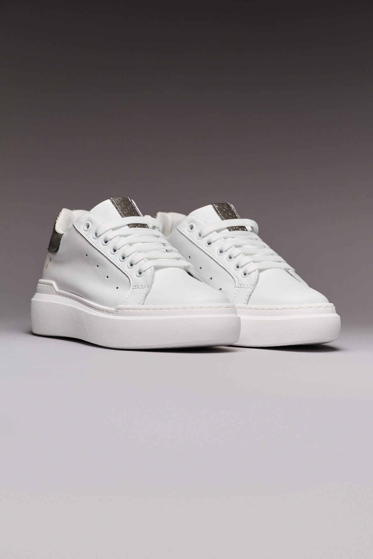 VEGA - White High-Top Sneakers with Silver Pixel Back