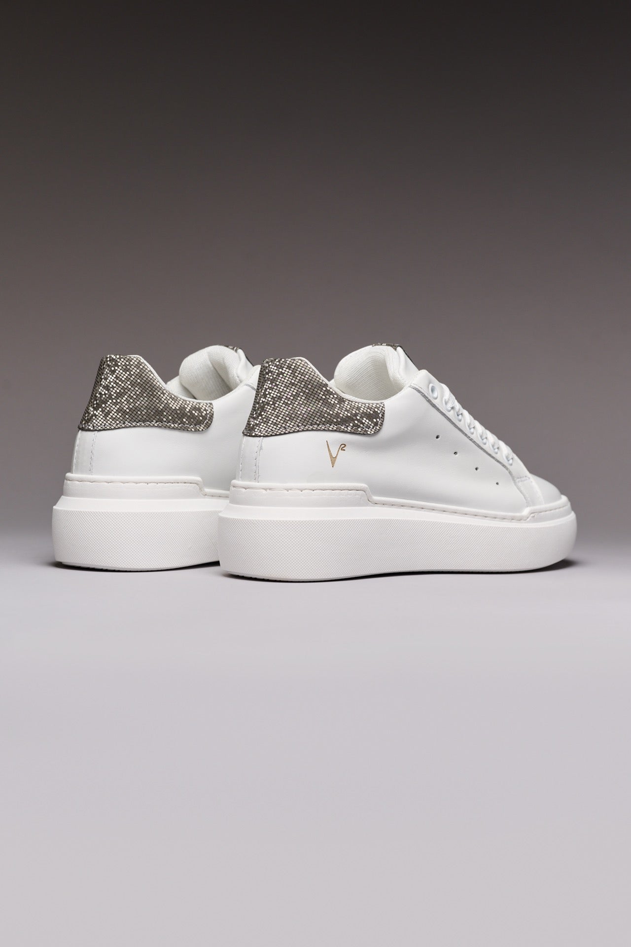 VEGA - White High-Top Sneakers with Silver Pixel Back