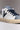 OLYMPIC - Low-top sneakers in white leather with blue Prince of Wales fabric tongue