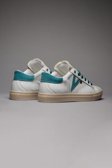 OLYMPIC - White low-top sneakers with light blue suede insert and back