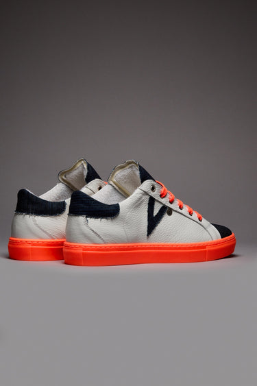 OLYMPIC RAINBOW - White low-top sneakers with neon orange sole and laces and denim tongue