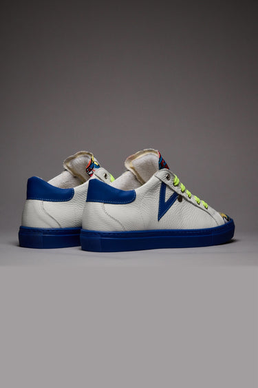 OLYMPIC RAINBOW - White low-top sneakers with Royal Blue sole, Fluorescent Yellow laces and Comics fabric tongue
