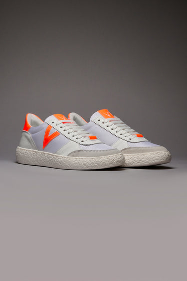 ATENA - Low-top white sneakers with fluorescent orange rubber inserts