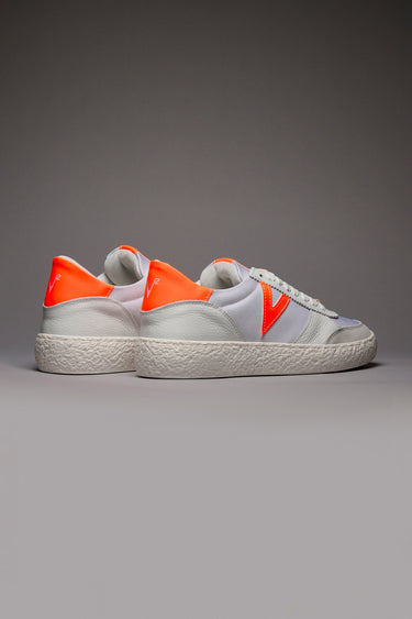 ATENA - Low-top white sneakers with fluorescent orange rubber inserts