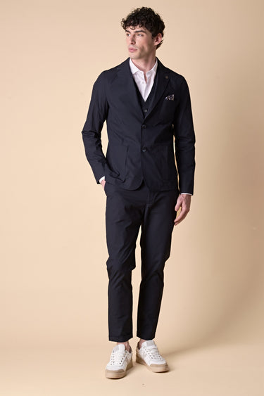 Tailored vest in blue jersey technical fabric with light blue denim details