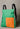 V2 x Mirantico - Zaino Memo Bag Verde con Tasca in tessuto Arancio Fluo