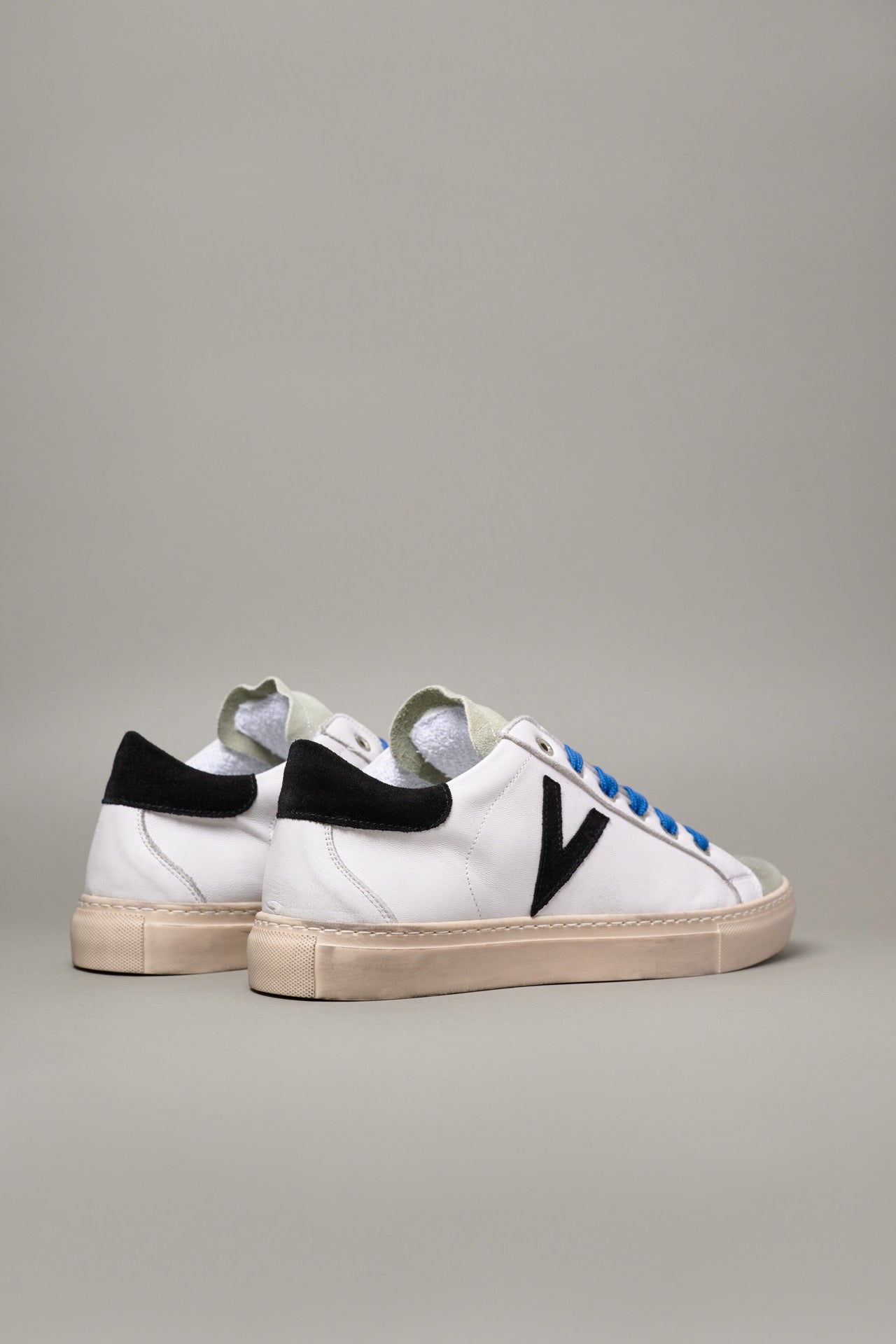 OLYMPIC - White low sole sneakers with Black suede back and insert and Blue laces