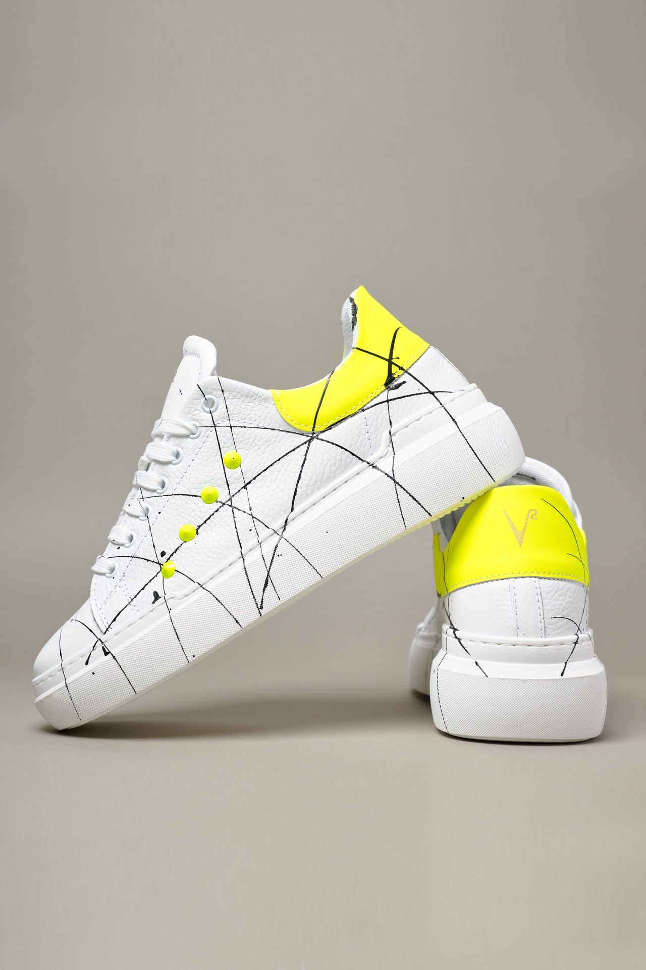 HAMMER - High sole sneakers in hammered leather with back and studs in Fluo Yellow and splashes of paint
