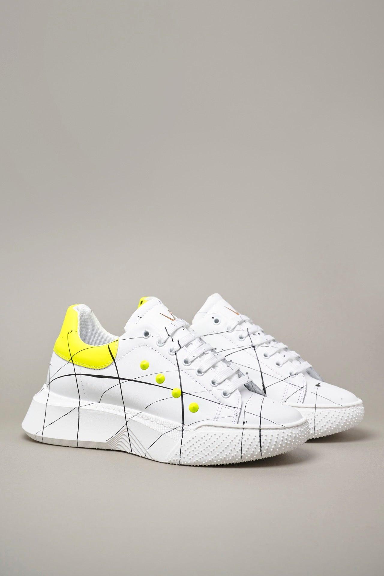 SUPERNOVA - Fluo Yellow high sole sneakers and studs with paint splashes