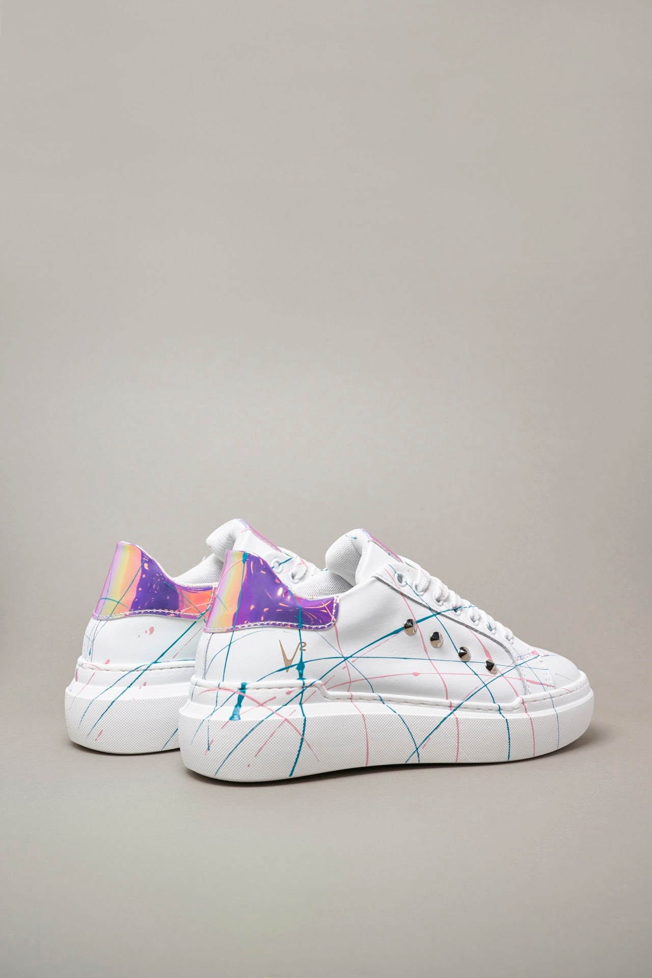 VEGA - Mirror high sole sneakers with studs and paint splashes