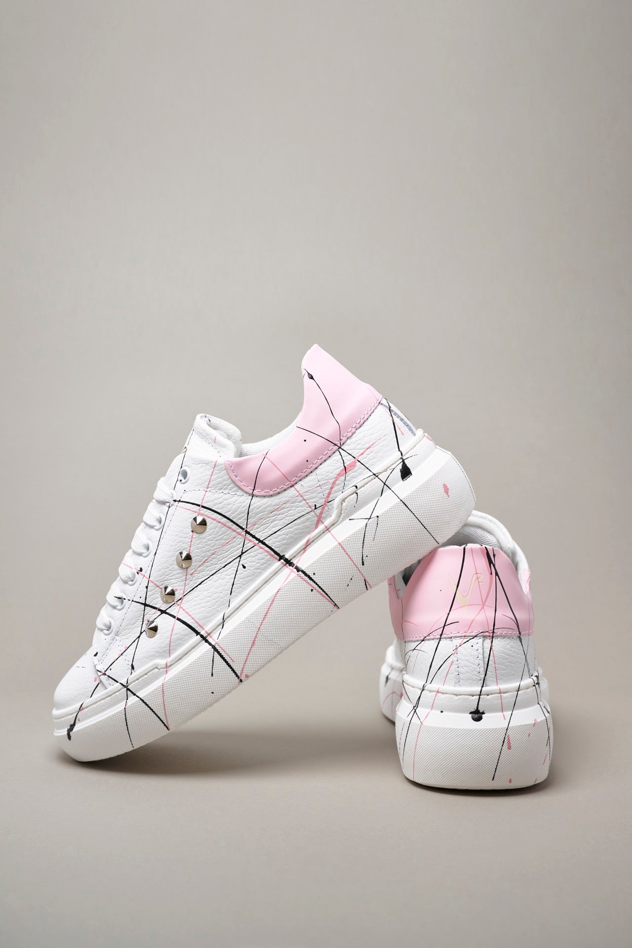 HAMMER - High sole sneakers in hammered leather with Pastel Pink back with studs and splashes of paint