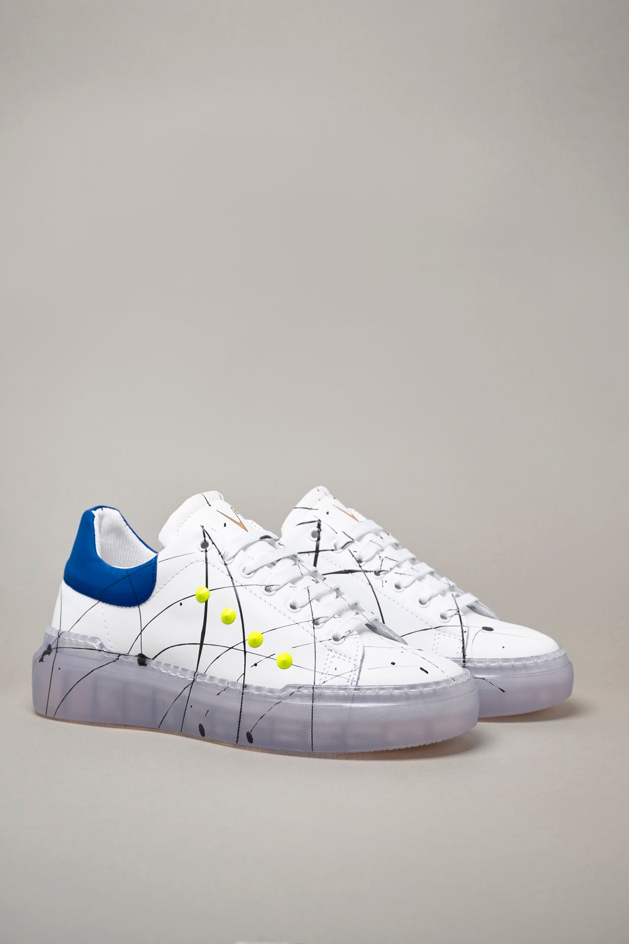GALAXY - Sneakers with high transparent Royal Blue retro sole with Fluo Yellow studs and Paint splashes
