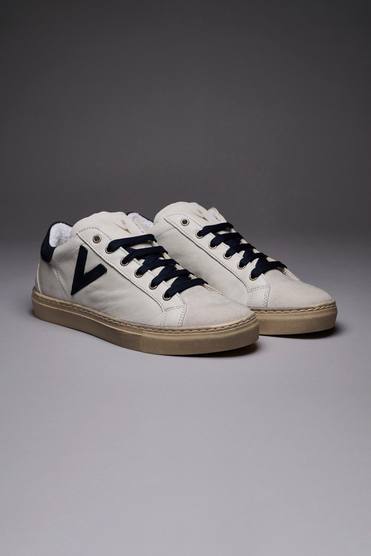 OLYMPIC - White low sole sneakers with blue suede back and insert