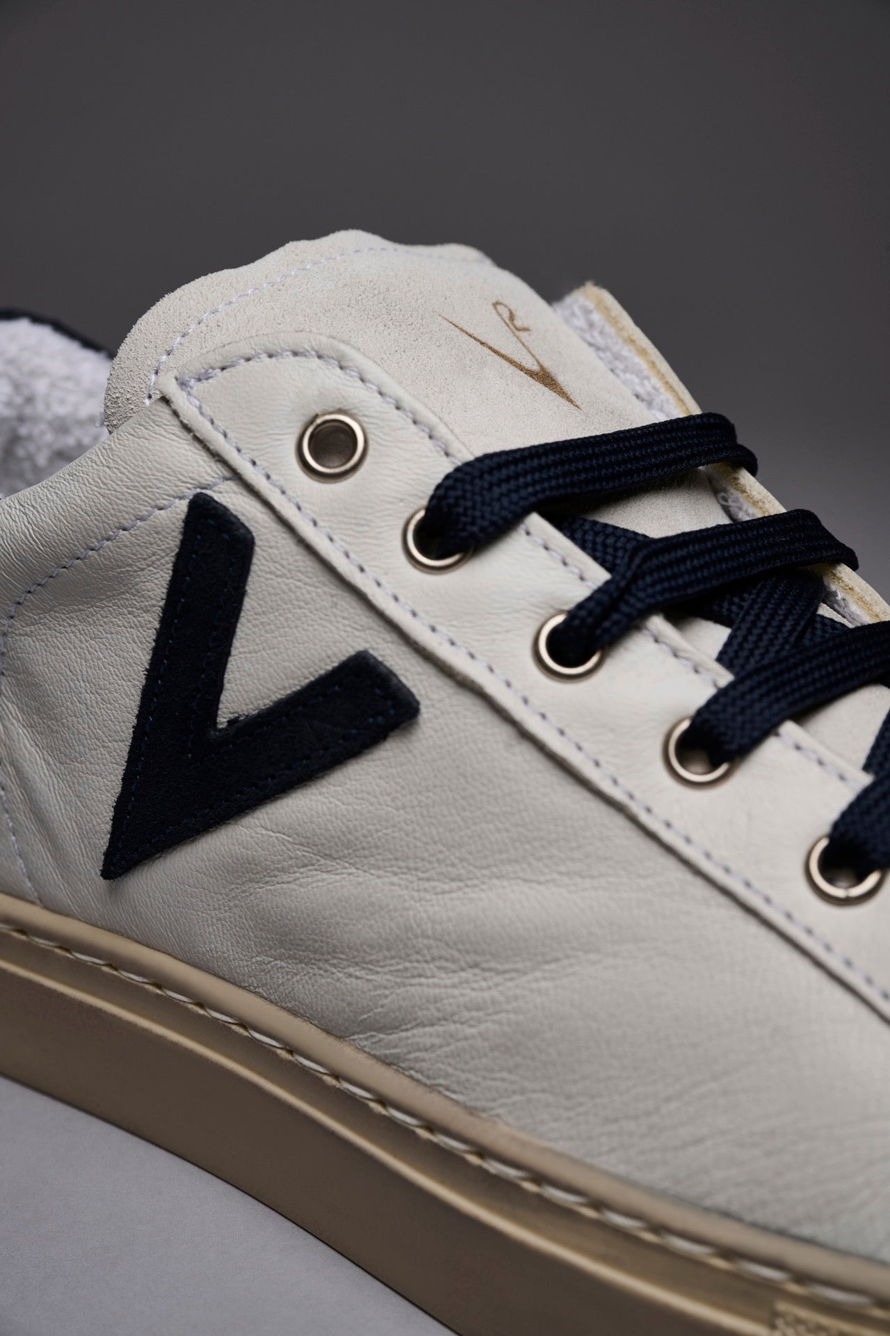 OLYMPIC - White low sole sneakers with blue suede back and insert