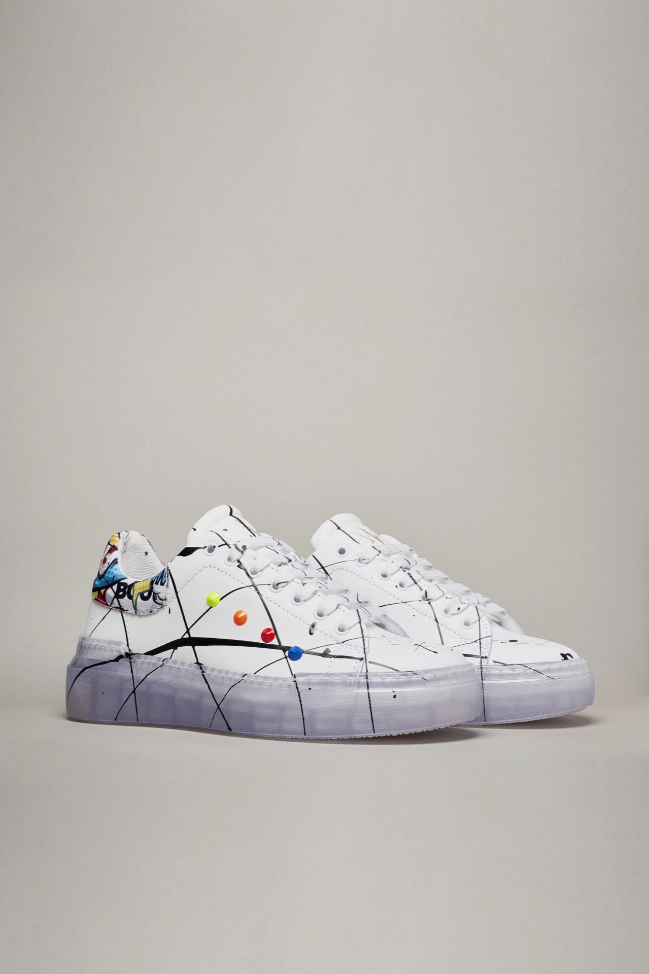 GALAXY - White sneakers with high transparent sole and Comics back with Multicolor studs and paint splatters